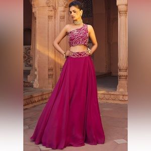CHARU AND VASUNDHARA
Pink Silk Embellished Lehenga Set